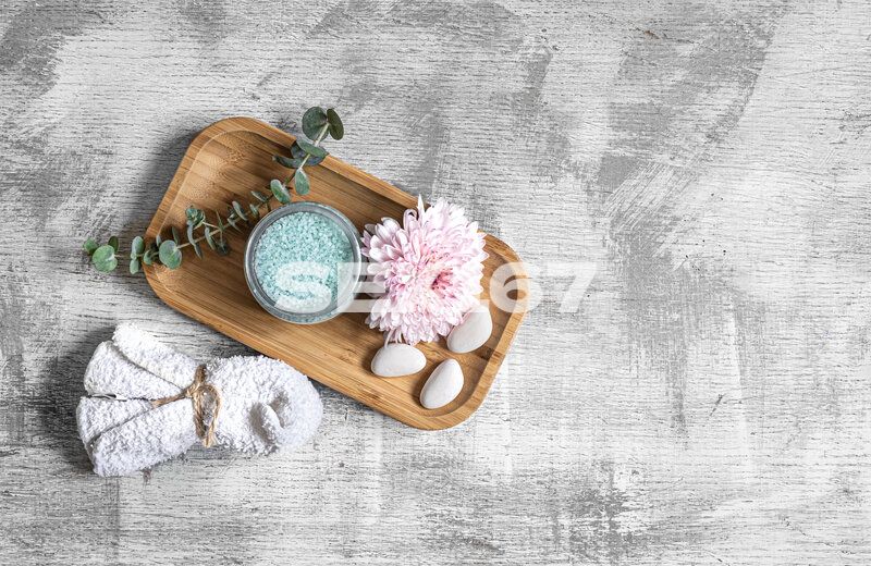 flat-lay-spa-composition-with-body-products-textured-concrete-background.jpg